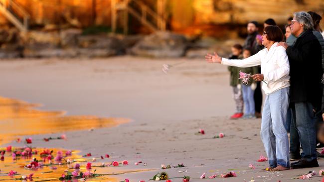 Family and friends hold a previous vigil not long after Justine’s death. Picture: John Grainger