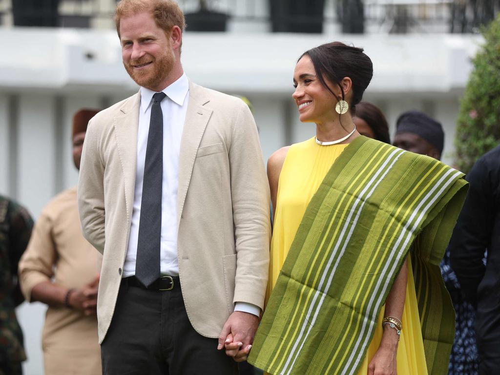 Meghan wore a bright yellow maxi dress on Mother’s Day that she had last worn at Archie’s birthday. Picture: AFP