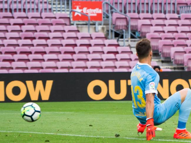 BARCELONA, SPAIN - OCTOBER 01: Lionel Messi of FC Barcelona scores his team's third goal during the La Liga match between Barcelona and Las Palmas at Camp Nou on October 1, 2017 in Barcelona, Spain. The match is being played with empty stands after the events occured in Catalonia during the voting of a Catalonia independence referendum declared illegal and undemocratic by the Spanish government. (Photo by Alex Caparros/Getty Images)