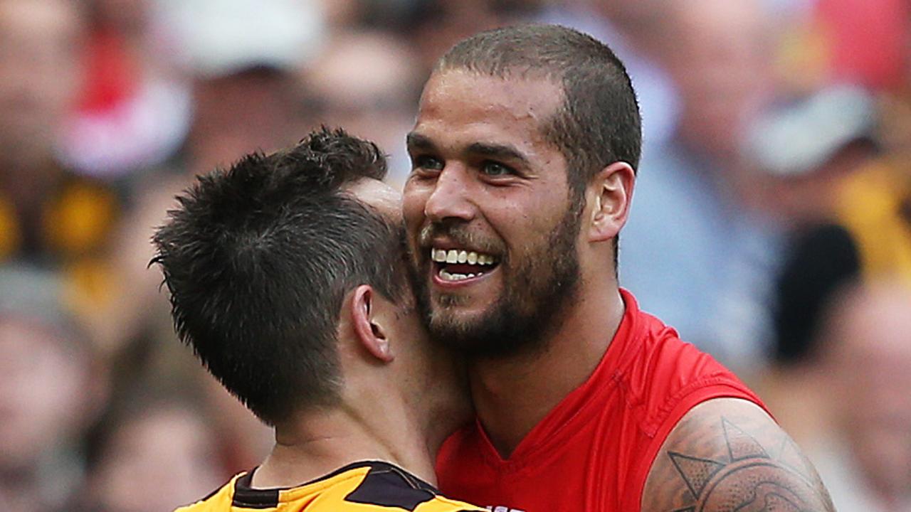 Sydney Swans' Lance Franklin has push and shove with Hawthorn's Luke Hodge during AFL Grand Final 2014 Sydney Swans v Hawthorn at the MCG. pic. Phil Hillyard