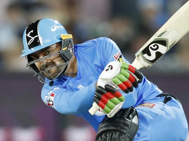 Rashid Khan of the Strikers hits a six  during the Big Bash League (BBL) cricket match between the Adelaide Strikers and Sydney Thunder at Adelaide Oval in Adelaide, Tuesday, December 31, 2019. (AAP Image/Kelly Barnes) NO ARCHIVING, EDITORIAL USE ONLY, IMAGES TO BE USED FOR NEWS REPORTING PURPOSES ONLY, NO COMMERCIAL USE WHATSOEVER, NO USE IN BOOKS WITHOUT PRIOR WRITTEN CONSENT FROM AAP