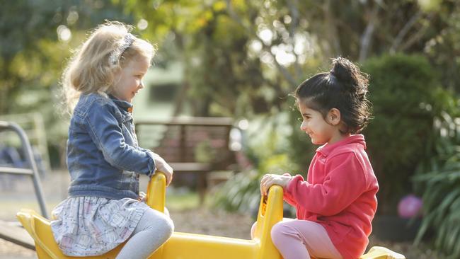 Five more enrolments for 2019 would tip the balance to keep them running. Maya and Alisha  on the seesaw. Picture: Valeriu Campan