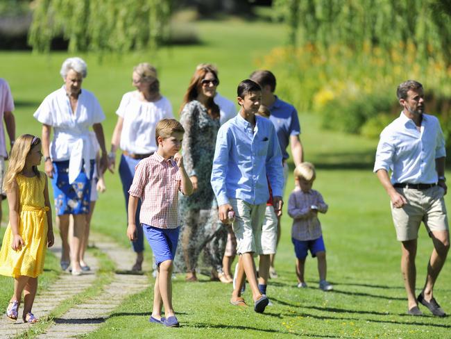 The Danish royal family take in the stunning gardens.