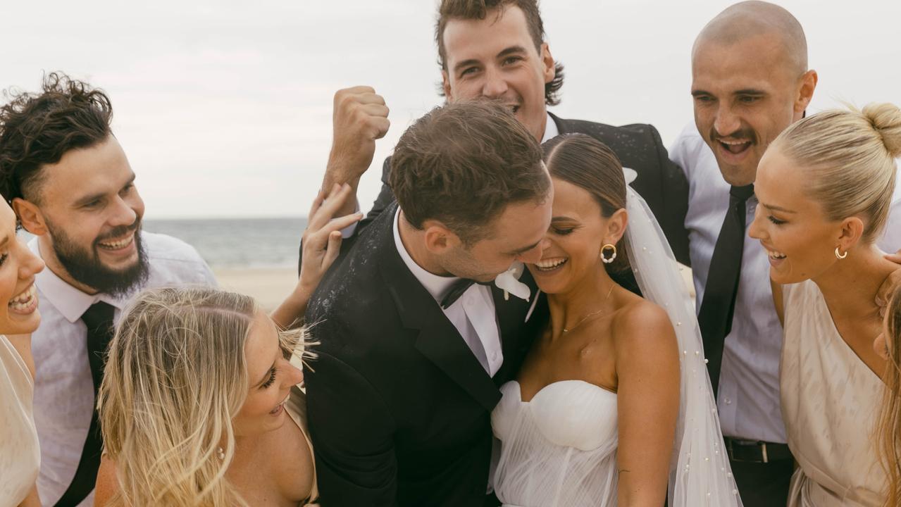 Port Adelaide star Jeremy Finlayson and his wife Kellie getting married at Tennyson Beach, with their bridal party. Picture: bambiphoto &amp; Danielle Symes