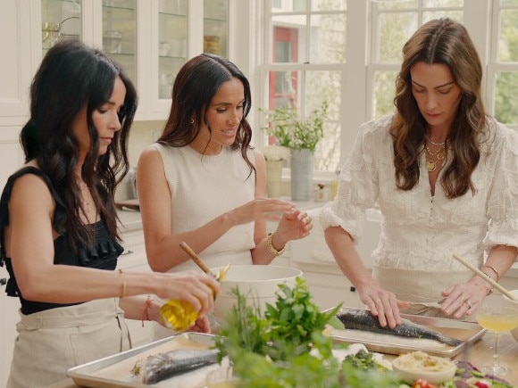 Meghan with her pals, Abigail Spencer and Kelly Zafjen. Picture: Netflix