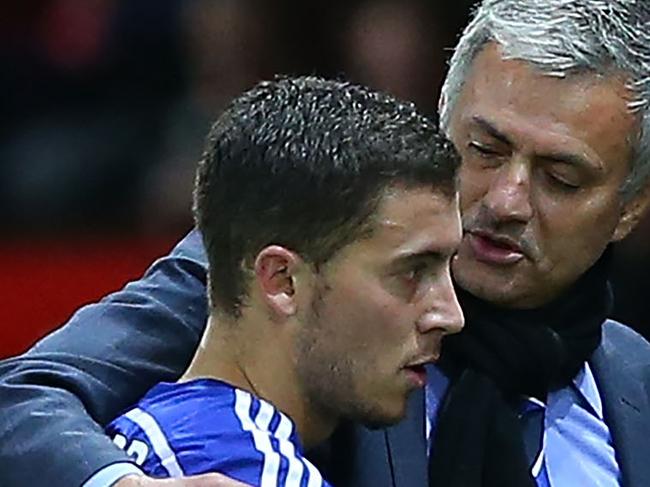 MANCHESTER, ENGLAND - OCTOBER 26: Chelsea Manager Jose Mourinho embraces Eden Hazard during the Barclays Premier League match between Manchester United and Chelsea at Old Trafford on October 26, 2014 in Manchester, England. (Photo by Alex Livesey/Getty Images)