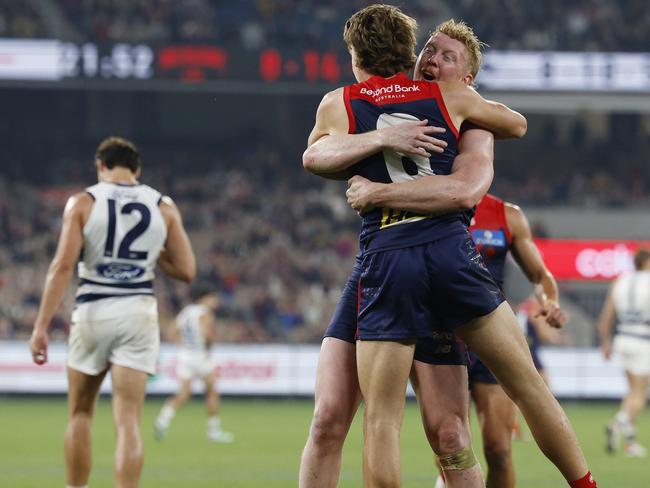 MELBOURNE , AUSTRALIA. May 4, 2024.  AFL. Melbourne vs Geelong at the MCG.    Clayton Oliver enjoys Caleb Windsors 4th qtr goal  . Pic: Michael Klein