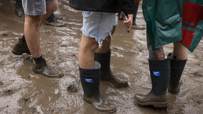 Festival-goers gumboots are seen in mud at Splendour in the Grass 2022 at North Byron Parklands. Picture: Getty Images