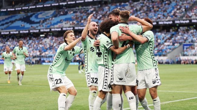 SYDNEY, AUSTRALIA – DECEMBER 14: Michael Ruhs of Western United celebrates with teammates after scoring a goal during the round eight A-League Men match between Sydney FC and Western United at Allianz Stadium, on December 14, 2024, in Sydney, Australia. (Photo by Matt King/Getty Images)