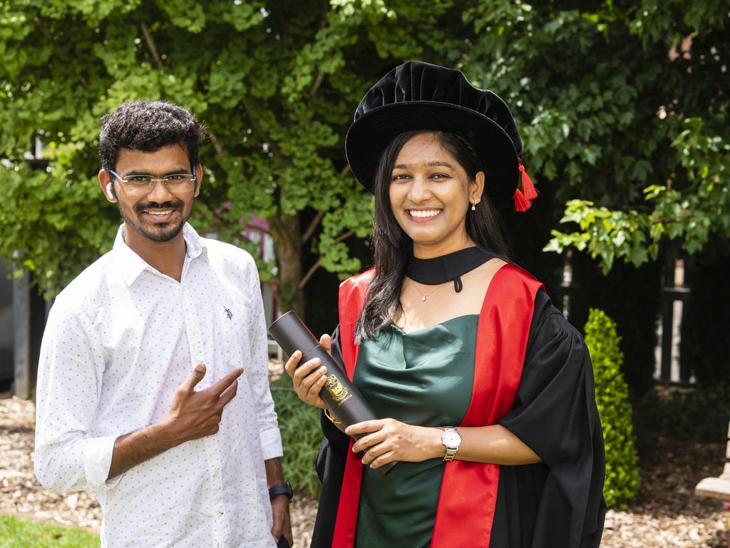 PhD graduate (agricultural biotechnology) Sonal Channale is congratulated by Naveen Naik at the UniSQ graduation ceremony at Empire Theatres, Tuesday, December 13, 2022.