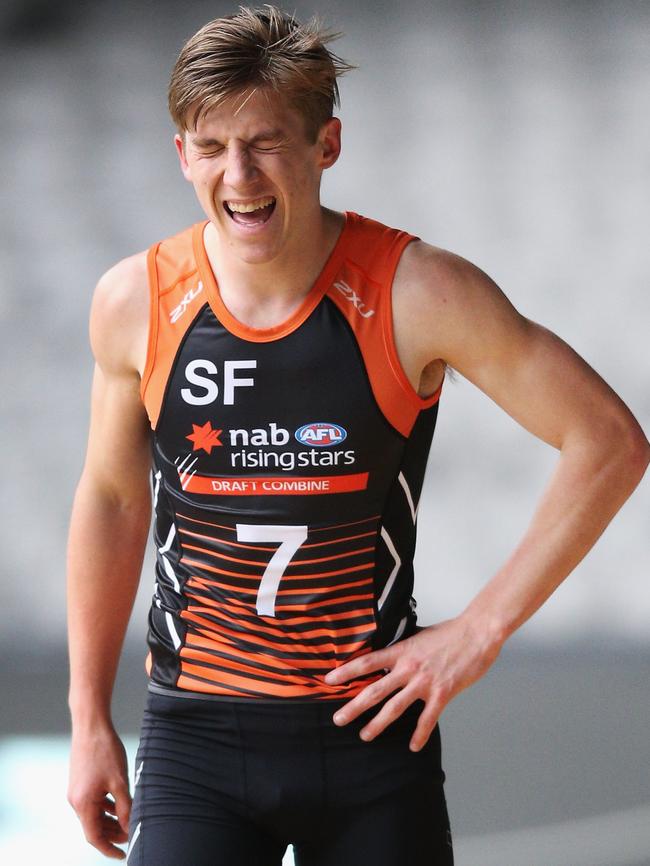 Dylan Moore recovers after the yo-yo endurance test at the AFL Draft Combine.