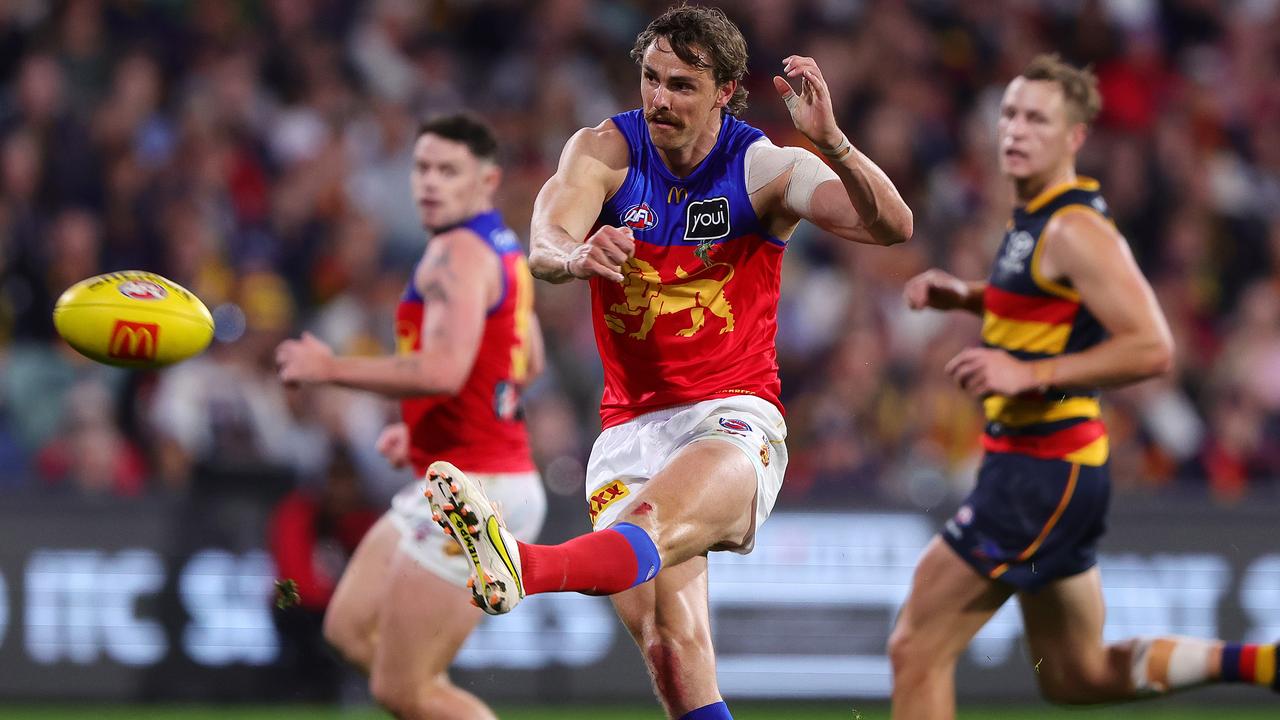 ADELAIDE, AUSTRALIA - MAY 12: Joe Daniher of the Lions kicks a goal during the 2024 AFL Round 09 match between the Adelaide Crows and the Brisbane Lions at Adelaide Oval on May 12, 2024 in Adelaide, Australia. (Photo by Sarah Reed/AFL Photos via Getty Images)