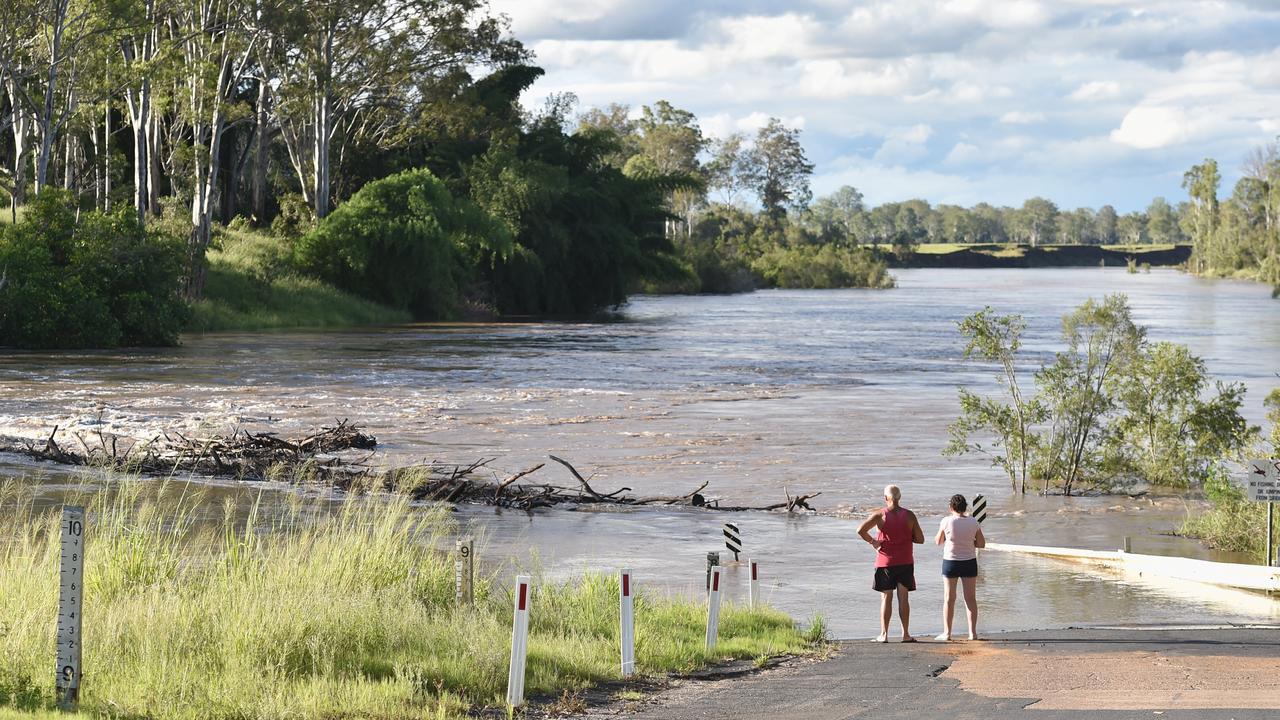 The Mary River flooding at Tiaro – pictured at 7.4m. Tiaro newcomers Errol and Raylene Derksen watch the river rise. Picture: Alistair Brightman