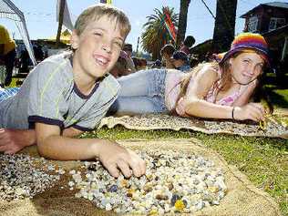 Fossickers: Kyle, 12 (left) and Aleriah, 10, Earl of Casino were on a treasure hunt searching for gems at the Lismore Gemfest on Saturday. Picture: Cathy Adams