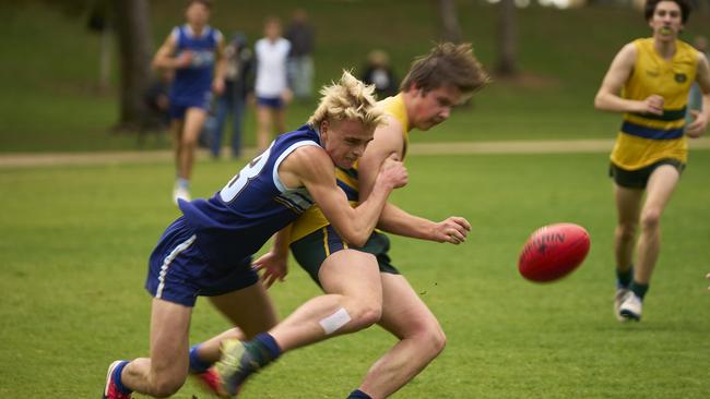 Jacob Ryan wraps up Pembroke opponent Josh Angus at Kensington Oval. Picture: Matt Loxton