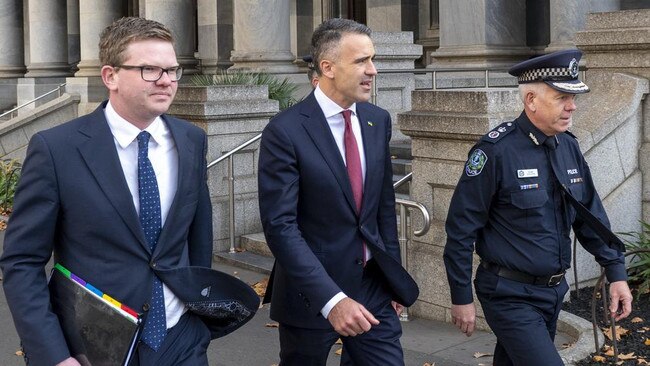 Health Minister Chris Picton, Premier Peter Malinauskas and Police Commissioner Grant Stevens walk to Government House for an Executive Council meeting. Picture: NCA NewsWire / Naomi Jellicoe