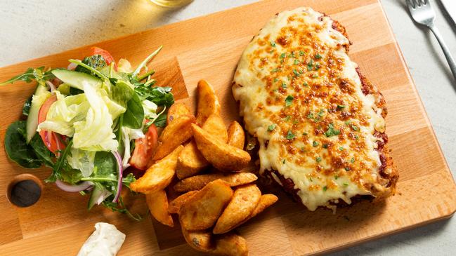 The Cheeky Pint's Parma is so big it has to be served on a chopping board. Image Samantha Scultz