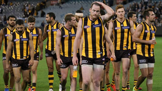 Jarryd Roughead leads the Hawks off the MCG. Picture: Wayne Ludbey