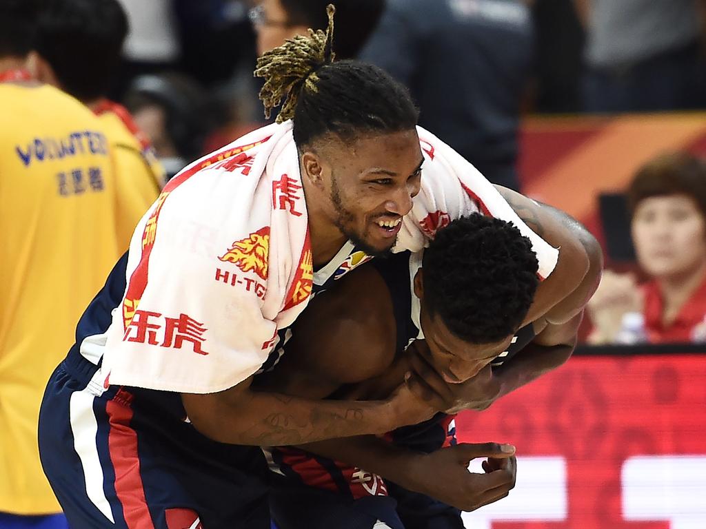 French players celebrate. (Photo by Ye Aung Thu / AFP)