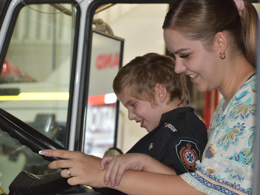 Honorary firefighter Grayson Little with his mum Rachel Little at the Mackay Fire Station. Picture: Lillian Watkins