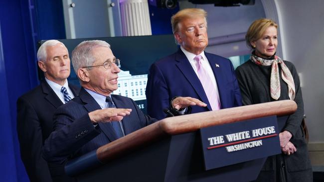 Director of the National Institute of Allergy and Infectious Diseases Anthony Fauci, with (L-R) Mike Pence, Donald Trump and Response coordinator for White House Coronavirus Task Force Deborah Birx. Picture: AFP.