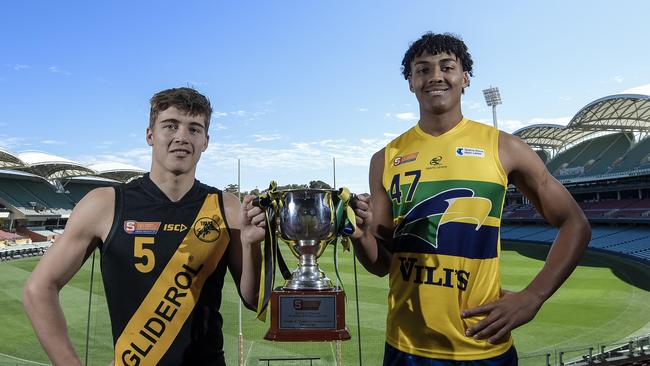 SANFL under-18 grand final captains Hugh Stagg (Glenelg) and Jordan Lukac (Eagles) with the premiership cup they will be playing for at Adelaide Oval on Saturday. Picture: Roy VanDerVegt.