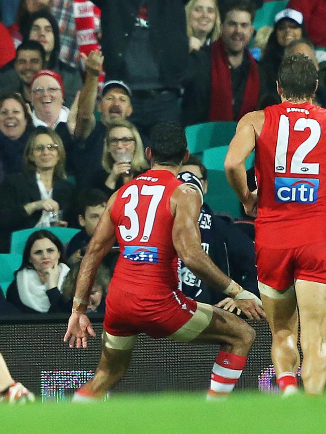 Sydney Swans' Adam Goodes celebrates a goal with an Indigenous dance directed at the crowd during AFL match Sydney Swans v Carlton at the SCG. pic. Phil Hillyard