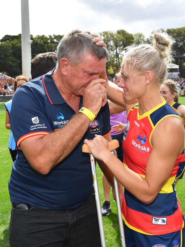 Erin Phillips and her father Greg after the AFLW Grand Final match between the Adelaide Crows and Carlton Blues at the Adelaide Oval. Picture: AAP Image/David Mariuz