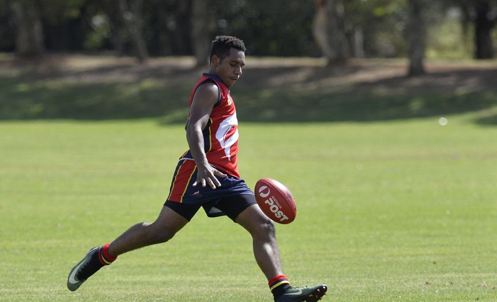 Melchizedek Kitao of Concordia kicks in the game against Laidley State High School in AFL Queensland Schools Cup Darling Downs round at Captain Cook ovals, Friday, April 27, 2018. Picture: Kevin Farmer