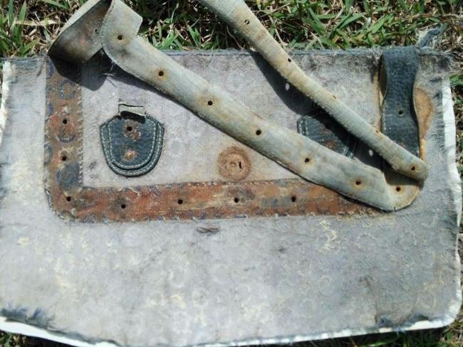 One of the 20 personal items found near suspected MH370 wreckage in Madagascar is this distinctive bag. Picture: Blaine A Gibson