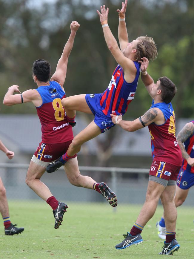 Football GDFL: Belmont Lions v Bell Post Hill Bell Post Hill 17 Will Ford takes a belter over Belmont Lions 8 Matthew Cimino and 42 Brad Storm ( right) Picture: Mark Wilson