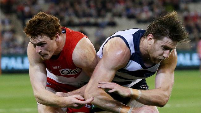 Gary Rohan and Geelong's Tom Lonergan collide. Picture: Colleen Petch.