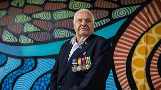 Aboriginal veteran Frank Clarke, in front of the an indigenous mural, in Port Augusta. Picture: Tom Huntley