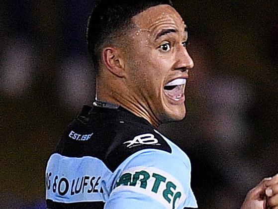 Valentine Holmes of the Sharks makes a break to score a try during the Round 18 NRL match between the Penrith Panthers and the Cronulla-Sutherland Sharks at Panthers Stadium in Sydney, Friday, July 13, 2018. (AAP Image/Dan Himbrechts) NO ARCHIVING, EDITORIAL USE ONLY