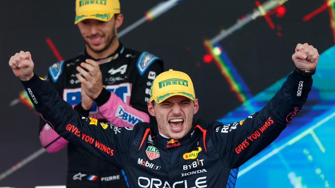 Max Verstappen shows his delight after winning the Brazil Grand Prix. (Photo by Miguel Schincariol / AFP)