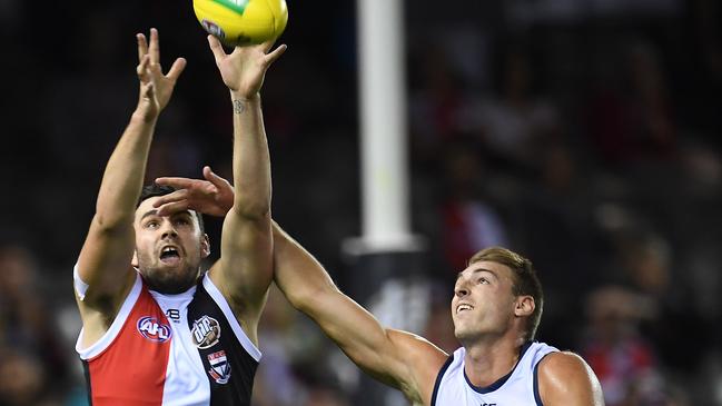 Daniel Talia attempts to spoil Saint Paddy McCartin. Picture: AAP Image/Julian Smith