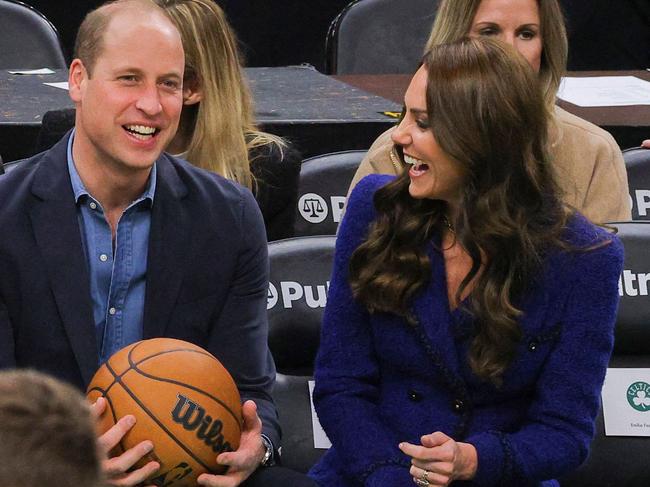 (L-R) Mayor of Boston Michelle Wu, Governor-elect Maura Healey, Britain's Prince William, and Catherine, Princess of Wales attend the National Basketball Association game between the Boston Celtics and the Miami Heat at TD Garden in downtown Boston,on November 30, 2022. (Photo by BRIAN SNYDER / POOL / AFP)