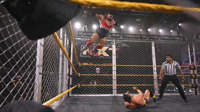 Bronson Reed with a colossal splash from the top rope against defending champion Johnny Gargano. Picture: WWE