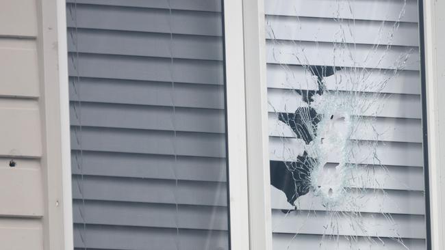 A close up of the bullet holes in a house in Marsden Park after a drive by shooting on Thursday night. Picture: NewsWire / Damian Shaw