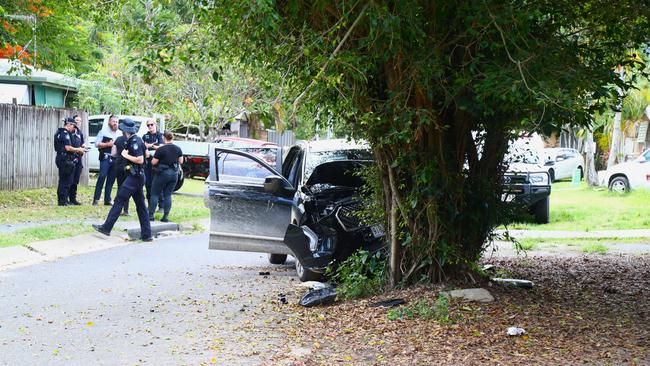 Police have set up a crime scene on McEwen St Mooroobool after the crash. Picture: Peter Carruthers