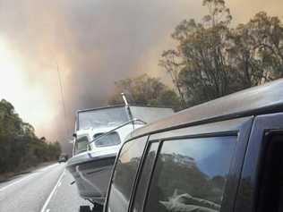Evacuation centre fills up as families flee fire
