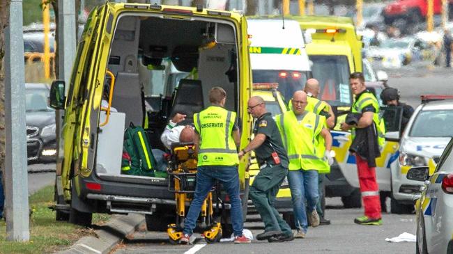 An injured person is loaded in an ambulance following a shooting at the Masjid Al Noor mosque in Christchurch, New Zealand, Friday, March 15, 2019. Picture: MARTIN HUNTER