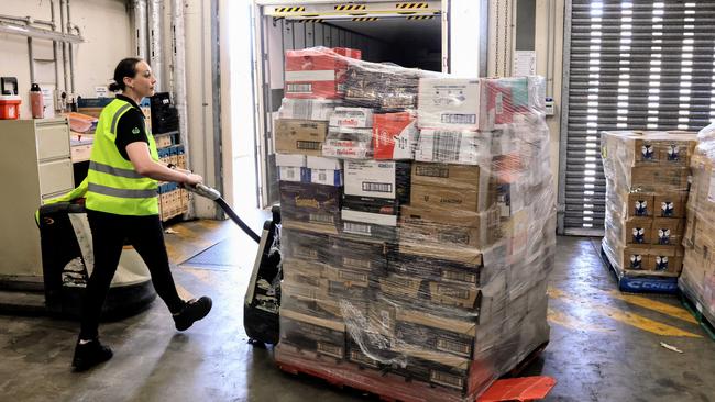 Pallets of food arriving off the truck in Cairns last week. Picture: Brendan Radke