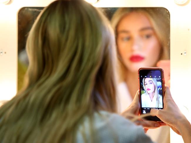 A model prepares backstage ahead of the David Jones Spring Summer 2017 launch. Picture: Mark Nolan/Getty Images