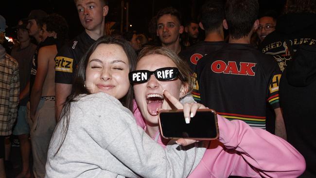 Penrith fans celebrating in the streets of Penrith after their team won the match.