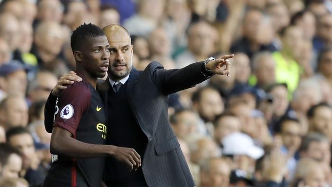 Kelechi Iheanacho, left, is spoken to by Manchester City’s manager Pep Guardiola