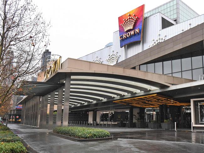 The entrance to the Crown Casino lies empty in Melbourne as its parent company Crown Resorts recorded a full-year net profit fall of 80 percent due to a COVID-19 coronavirus forced closure. Picture: AFP