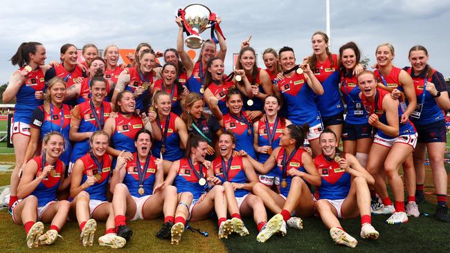 Melbourne players with the premiership cup. Picture: Getty Images