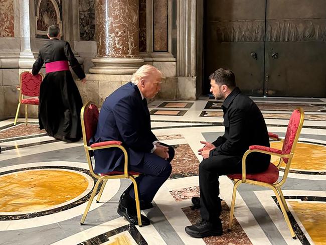 TOPSHOT - In this handout photograph taken and released by the Ukrainian Presidential Press Service in Kyiv on April 26, 2025, Ukraine's President Volodymyr Zelensky (R) meets with US President Donald Trump (L) on the sidelines of Pope Francis's funeral at St. Peter's Basilica at the Vatican. (Photo by Handout / UKRAINIAN PRESIDENTIAL PRESS SERVICE / AFP) / RESTRICTED TO EDITORIAL USE - MANDATORY CREDIT 