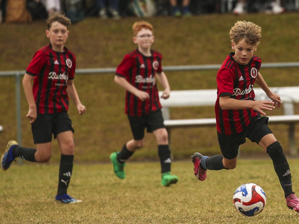 PRINT EDIT U/10Ã•s Michelton FC V Burliegh in the Premier Invitational Football Carnival at Nerang. Picture: Glenn Campbell